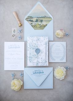 the wedding stationery is laid out and ready to be used