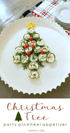 a christmas tree made out of sushi rolls on a plate with the words christmas tree party pinwheel appetizer