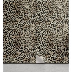 an animal print wall hanging on a wall