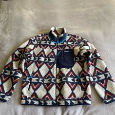 Patagonia Classic Retro X Fleece Jacket Sz L In Brass Hawk Pattern. Condition Is Excellent. From Patagonia: "A Warm And Windproof Layer That Rocks An Updated Retro Look From Patagonia’s Archives. New To Their Lineup Of Excellent Outerwear, The Classic Retro-X Jacket Takes The Look Of A Vintage Fleece Zip-Up (A Look Patagonia Pretty Much Invented About 35 Years Ago) And Pairs It Up With Modern Materials That Cut Wind, Trap Warmth, And Keep The Vibe Properly Chill. Patagonia Long Sleeve Fleece Jacket For Hiking, Blue Patagonia Outerwear With Pockets, Patagonia Blue Winter Outerwear, Blue Patagonia Winter Outerwear, Winter Blue Patagonia Outerwear, Midweight Blue Fleece Jacket For Winter, Cozy Blue Fleece Jacket For Outdoor, Cozy Blue Outdoor Fleece Jacket, Clothing Wishlist