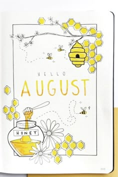 an open notebook with the words hello august written in yellow and honey on it next to a beehive