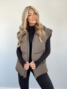 Elevate your winter wardrobe with our Puff Up Vest. This long, neutral vest features a collared neckline and zipper closure for a stylish and cozy look. The puffer design and quilted stitching provide warmth and comfort, making it perfect for layering during colder days. With pocket details, it's perfect for both lounging and running errands in style. Complete your trendy and luxurious look with this must-have piece for all your shopping needs. Self 100% Polyester Hand wash cold. Outfits With Vests For Women, Brown Vest Outfit, Thrift Inspiration, Vest Outfits For Women, Trendy Mom Outfits, Total Girl, Puff Vest, Casual Outfits For Moms, Outfit Styling