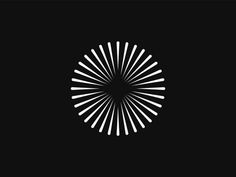 an abstract black and white logo with sunbursts in the center on a dark background