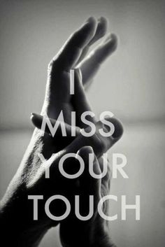 a person holding their hand up with the words i miss your touch