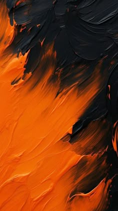 an orange and black abstract painting with dark streaks on the bottom half of the image