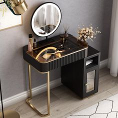 a dressing table with a mirror, vase and other items on it in front of a gray wall