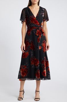 For slimming style and a flattering fit, this faux-wrap dress is an easy winner in the wardrobe game. 49 1/2" length Hidden back zip; keyhole with button-and-loop closure Surplice V-neck Short sleeves Removable tie belt Lined 100% polyester Hand wash, line dry Imported Floral Wrap Dress Midi, Velvet Floral Dress, Wedding Guest Dress For Fall, Dark Floral Dress, Romantic Dresses, Burnout Velvet Dress, Velvet Tie, Midi Dress Formal, Black Floral Dress