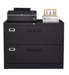 a black filing cabinet with two drawers and a printer on top