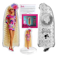 the barbie doll is next to its packaging