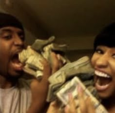 two people holding money in their hands and one has his mouth open to the camera