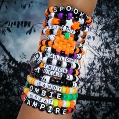 Spooky Halloween Kandi! - Kandi Singles - Mystery Grab Bag - Kandi Confetti - Bulk Bracelets Mystery Kandi! Photos Are Just Examples Of What You May Get These Bracelets Have Colors And Words Related To Halloween. Most Have White, Black, Orange, Purple, Green, Yellow, Or Red Beads. Some Bracelets Have Skulls, Cats, Bats, Pins, Or Stars. Some Glow In The Dark; Activate Them By Exposing Them To Light First (Flashlights Work) *I Don't Have Any More Pumpkins* Made With Black Stretchy Cord Message Me Halloween Kandi Ideas, Kandi Halloween, Homemade Bracelets With Beads, Goth Kandi, Halloween Kandi, Kandi Singles, Pulseras Kandi, Kandi Inspo, Diy Kandi Bracelets