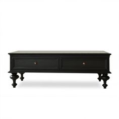 a black coffee table with two drawers