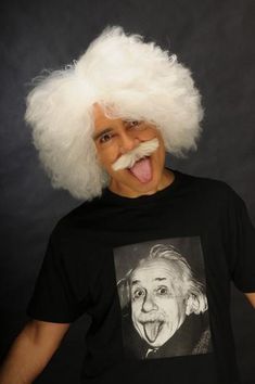 This white wig captures the iconic, wild hair associated with Albert Einstein, made from high-quality synthetic polypropylene fibers that offer a realistic texture and appearance. The accompanying bushy mustache is handmade on lace, ensuring a natural and authentic look. This wig is perfect for those seeking an accurate representation for cosplay, Halloween, or themed events. The wig is designed with a large elastic base, allowing you to easily place your hair inside and keep it securely in place, even during intense movements or dancing. The base has a circumference of 17 inches (42 cm) and can extend up to 25 inches (63 cm), offering a customizable fit tailored to your individual needs. Made in our small manufactory in Athens, Greece. Bushy Mustache, White Wig, Wild Hair, Themed Events, Cosplay Halloween, Costume Wigs, Costume Hats, Athens Greece, Albert Einstein