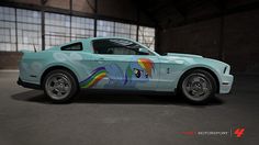 a car painted with an image of a rainbow horse