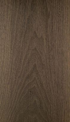 an image of wood grain textured with dark brown tones on the edges and sides