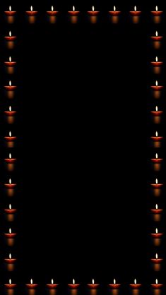 a black background with candles in the middle and an empty space for text or image