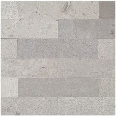 a tile floor with grey and white colors