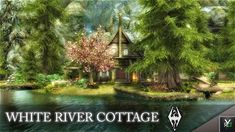 the white river cottage is surrounded by trees