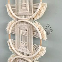 a wall hanging made out of woven material