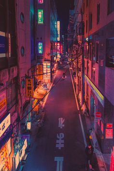 an empty city street at night with neon signs on the buildings and people walking down it