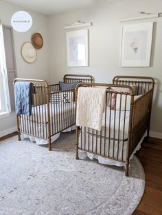 two baby cribs in a white and beige nursery