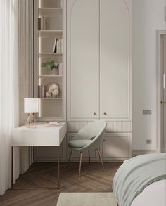 a bedroom with white walls and wooden floors