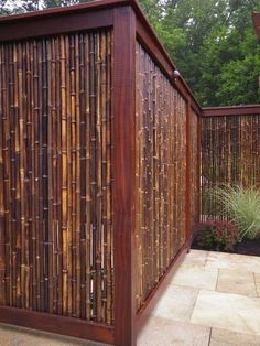 an image of a fence made out of bamboo