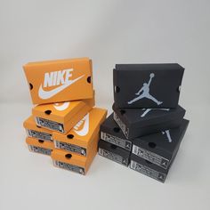 nike boxes stacked on top of each other