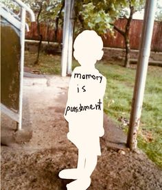 a person standing in the dirt with words written on it