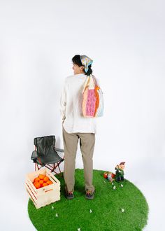 Poses for editorial photoshoot with indoor garden and white backdrop. Crochet tote bag, market bag. Styled by IG: @wholewheatdanish // photo by IG: @allywei