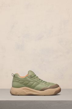 olive green nappa leather panelled design pull-tab at the heel branded insole logo-embossed tongue front lace-up fastening perforated toebox round toe flat rubber sole Sneakers Green, Men In Black, Ami Paris, Saved Items, Sporty Style, Panel Design, Nappa Leather, You Bag, Low Top