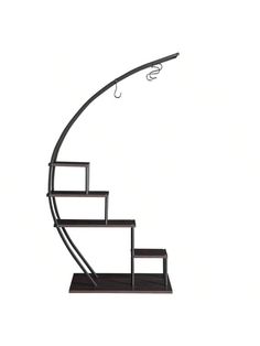 a metal and wood staircase with an umbrella on it's handrail, against a white background