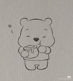 a drawing of a bear holding a mug