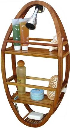 a wooden circular shelf with bottles, soaps and other personal care items on it