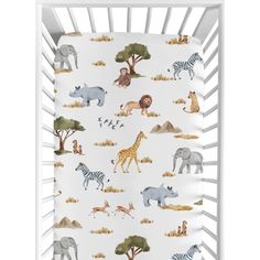 a baby crib bed with animals and zebras on the sheet in white background