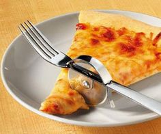 a slice of pizza on a plate with a fork and knife