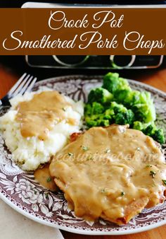 a plate with gravy, mashed potatoes and broccoli on it