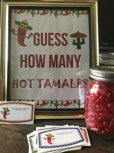 there is a sign that says guess how many hot tamales are in the jar