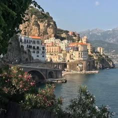 an old town on the edge of a body of water