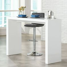 This contemporary style bar table offers a clean, minimalist look for dining areas and other rooms. The design comes in a crisp, high-gloss white finish. The open design means you can place storage units or ottomans underneath. Size: 40 x 60 x 18. Modern Bar Table, Kitchen Bar Table, Diy Home Bar, High Top Tables, Pub Table Sets, Bar Height Table, High Table, Modern Bar, Pub Table