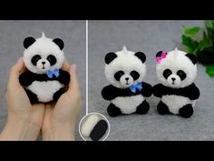 two stuffed panda bears sitting next to each other