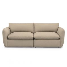 a beige couch on a white background