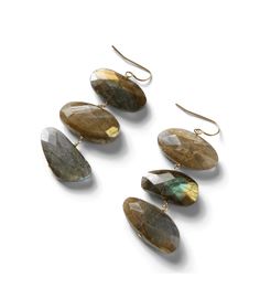 Expertly crafted with labradorite stones, these tiered gemstone earrings are a perfect addition to your jewelry collection. The three tiers add dimension and elegance, while the earthy tones bring a natural touch to any outfit. Material: Labradorite, 14k gold filed Dimensions: 2.5"H Weight: 0.70 oz.  Made in USA Earthy Accessories, Earthy Jewelry, Green To Blue, Earrings Teardrop, Labradorite Stone, Earthy Tones, Gemstone Earrings, Labradorite, Jewelry Collection