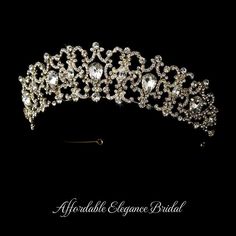 Regal%20Gold%20Plated%20Wedding%20Tiara%20Crown%0D%0AThis%20fabulous%20gold%20plated%20wedding%20tiara%20is%20fit%20for%20royalty!%20The%20elaborate%20scroll%20design%20is%20accented%20with%20brilliant%20round%2C%20marquise%20and%20tear%20drop%20crystal%20rhinestones%20for%20a%20stunning%20effect!%0D%0ASize%3A%20Decorated%20Portion%20is%201.5%22%20Tall%20and%208%22%20Across.%0D%0AColor%3A%20Gold.%0D%0AStyle%3A%20hp9830g.%0D%0AAlso%20Available%20in%20Antique%20Silver%20Plating%20as%20hp9830.%0D%0AA%20stunning%20headpiece%20for%20your%20formal%20wedding%20or%20quinceanera.%0D%0APlease%20allow%201%20week%20for%20delivery.%0D%0AShipping%20Policy.%0D%0AReturn%20Policy Beaded Edge Veil, Winter Wedding Accessories, Gold Bridesmaid Jewelry, Beaded Wedding Veils, Rose Gold Tiara, Rose Gold Wedding Jewelry, Rose Gold Bridesmaid, Veil Accessories, Royal Crowns