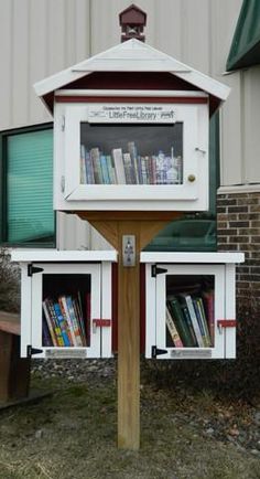 two bookshelves in front of a building