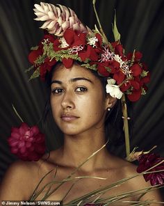 a woman with flowers in her hair