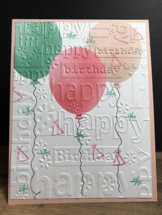 a birthday card with balloons on it