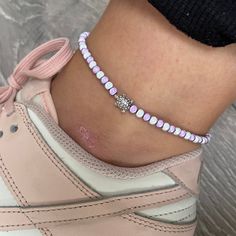 🌸 white and violet turtle miracle bead anklet 🌸  ♥️Catches the light to give off a glow!  ♥️Perfect for nights out or even holidays!  ♥️ All anklets are made on rope. The two ends will need to be tied together and in a double knot so that the anklet does not come off. These are safe to wear in water.  Also available with matching bracelets, earrings and chokers! The colour may vary slightly due to most images being taken under direct sunlight or with flash to show you the full effect of the beads x White beads may appear grey/silver when opened in a dark room. The full effect of the beads will shine through in different lights. Please note: Buyer pays for any return postage/ exchange postage x Adjustable Purple Anklets As Gift, Handmade Purple Anklets As Gift, Adjustable Purple Anklets, Elephant Anklet, Turtle Charm, Beaded Anklets, Anklet Bracelet, Anklet Jewelry, Matching Bracelets