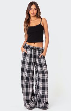 Online only! Cozy up at home while feeling super cute. pair them with a cute t-shirt or any sweatshirt you want and you'll have the perfect fit for any winter day or night at home.   	Pants 	Wide leg 	Adjustable tie waistband 	Plaid patterned fabric 	Cotton, Polyester 	Model wears size S 	Model height is 5'9 	Item care: Wash with similar color Plaid Wide Leg Pants, Wide Leg Lounge Pants, Lace Trim Tank Top, Plaid Decor, Women Y2k, Women Pants, Ribbed Tank Tops, Vintage Casual