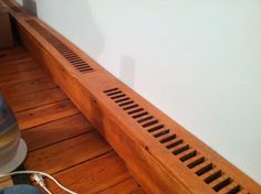 a close up of a person's feet on the ground near a piano keyboard